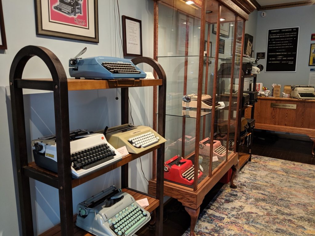 Refurbished typewriters line the shelves of Gramercy Typewriter Company.