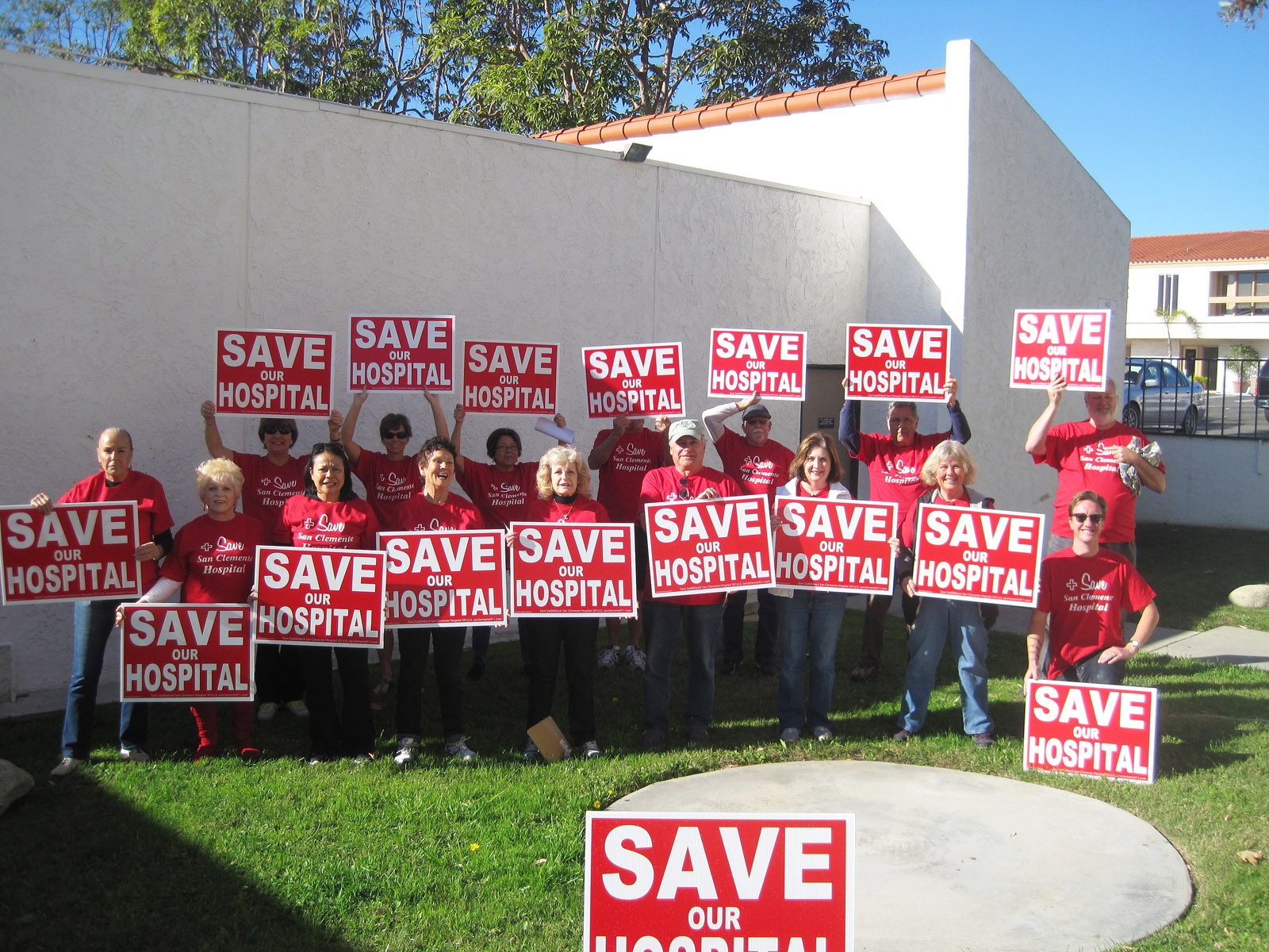 Protestors at an event in 2015. Carol Wilson pictured second from left. (Photo via Carol Wilson)