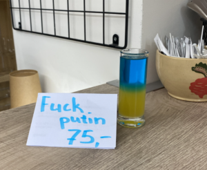 The "Fuck Putin" drink, a blue and yellow cocktail.