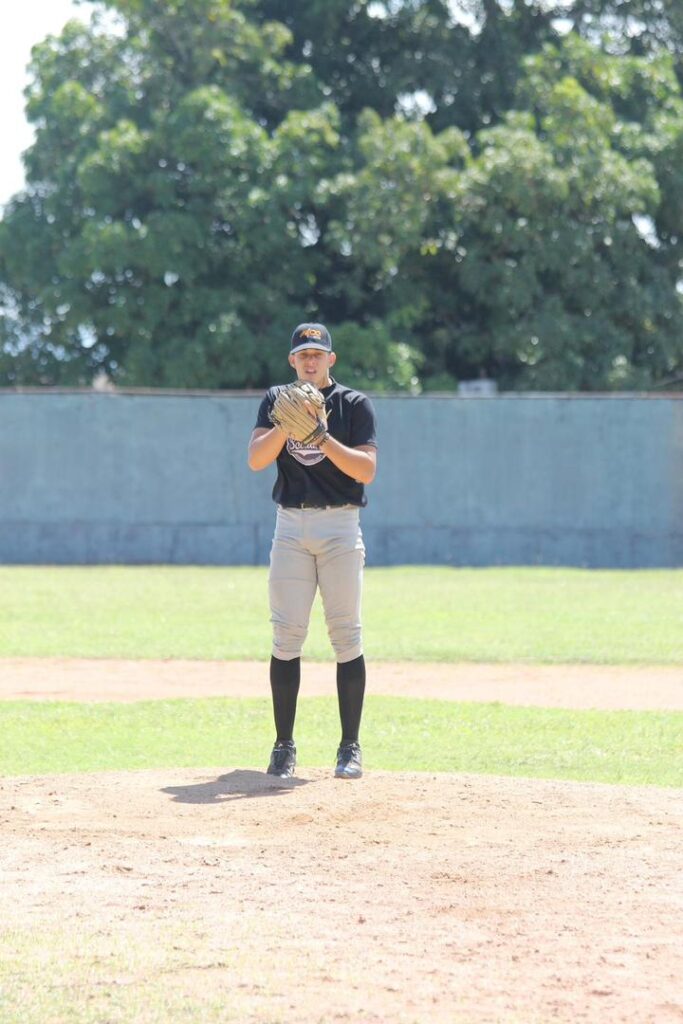Jesus Gomez pitching during a game in Venezuela.