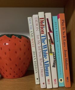 Joan Didion books on a bookshelf