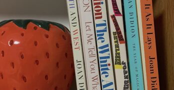 Joan Didion books on a bookshelf