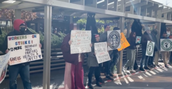 Union workers protest outside the NYC Starbucks Reserve Roastery.