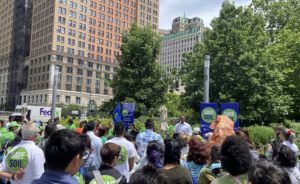 New York Assembly Member Charles Fall giving a speech in front of a crowd of Walkathon participants on Jun 18 2022 in Battery Park, New York City