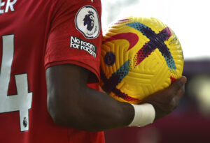 View of "No room for racism" badge worn by players during the English Premier League soccer match between Nottingham Forest and Leeds United at City ground in Nottingham, England, Sunday, Feb. 5, 2023