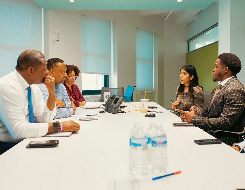Heeta Thakkar at a table with members of NYC DYCD