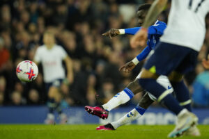 Everton's Idrissa Gueye kicking a soccer ball during the English Premier League