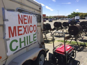 Green chile from Hatch, N. M., goes on sale at a roadside roasting stand in Santa Fe, N.M.