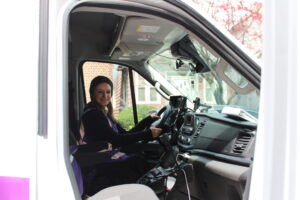 Leah Levine sits inside one of the ambulances belonging to Ezras Nashim.