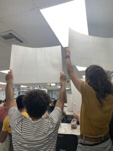 Protesters at Community Board Meeting. 