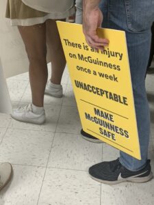 Protesters at Community Board Meeting.