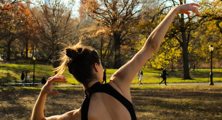 Dancer dancing in Central Park during the fall season.