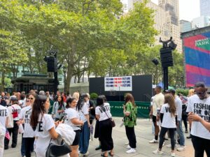 Attendees for the "Fashion for our Future" march gather in Bryant Park.