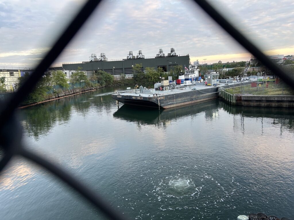 Seen from the Metropolitan Ave Bridge in East Williamsburg, water bubbles up from the Newtown Creek.