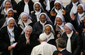 Pope Francis is cheered by nuns